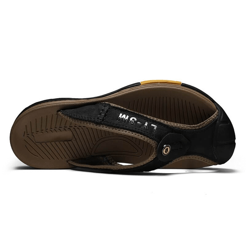 Bottom view of Casual Men's Genuine Leather Anti-slip Flip Flops SF1068, showcasing durable rubber outsole and anti-slip design.